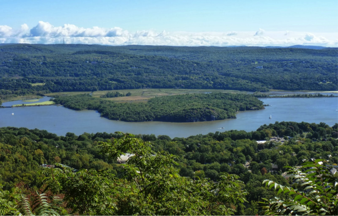 Next, cross over the Hudson from the Westchester side, using the Bear Mountain Bridge.   After crossing the bridge, you head up the Palisades Parkway to exit 19 where you get lost in the wilderness and find yourself climbing steadily until finally making it up to the top of Bear Mountain State Park (See above.) Look for Perkins Memorial Drive and Tower, which is a great place for exploring and photos.  dan3  View from US-9W overlooking the Hudson River